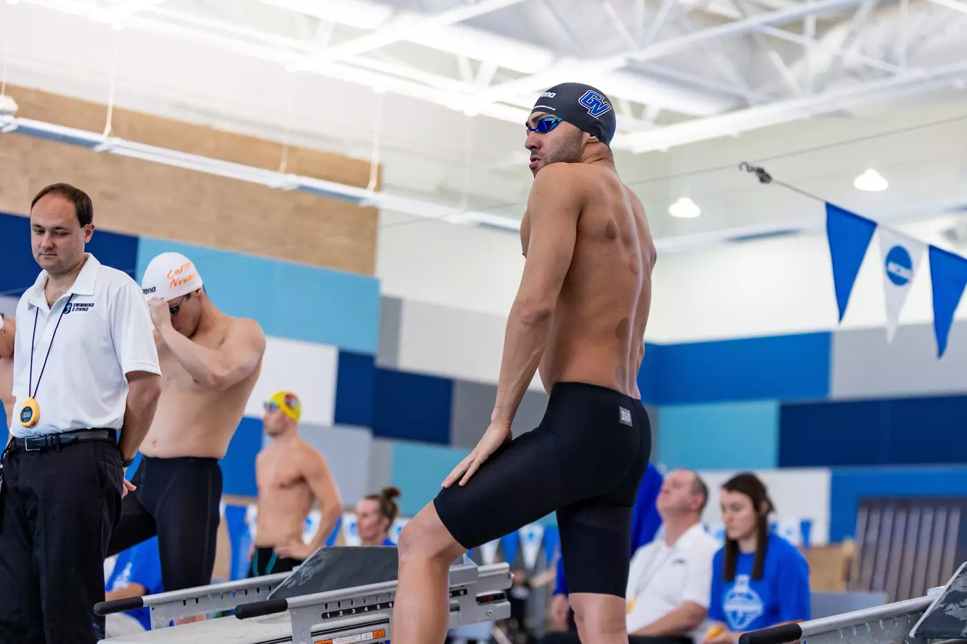 Mahmoud behind the blocks before a race